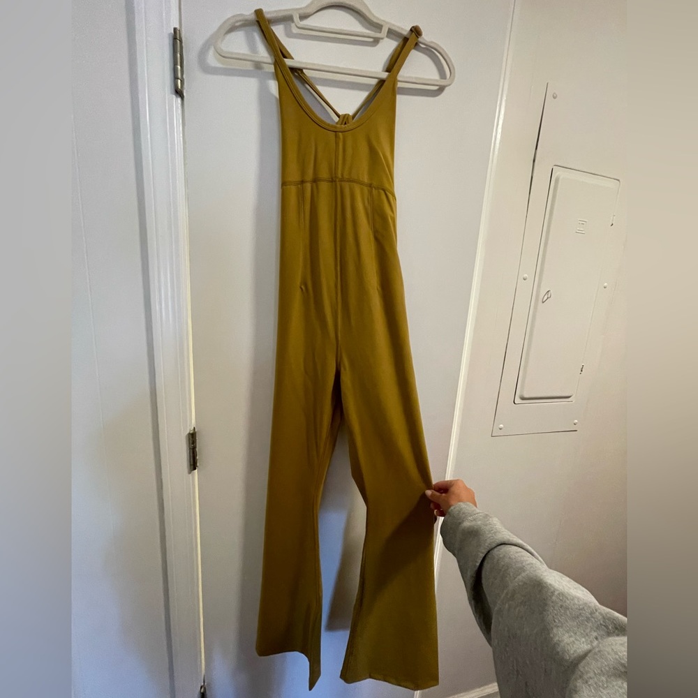 Selling my FREE PEOPLE MOVEMENT all star onesie size xs!